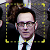 Harold Finch from Person of Interest looking up with a digital yellow box around his head