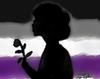 Silhouette of a woman in front of the ace flag