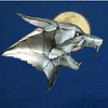 Steel Wolf's Head with the moon behind it