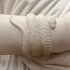 Snake on wrist in marble