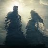 image of Halbrand and Galadriel reflecting in the water